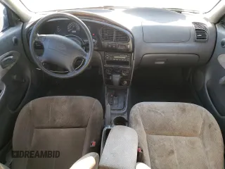 2003 Kia Spectra with VIN KNAFB121935265035, listed as a Copart auction lot 86407934 with 201,586 mi miles and Salvage Title. Bid and sale history available at DreamBid. Image 8.