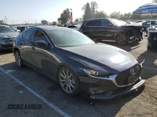 2021 Mazda 3 Select with VIN 3MZBPABLXMM251688, listed as a Copart auction lot 85704604 with 51,866 mi miles and Salvage title. Bid and sale history available at DreamBid. Image 4.