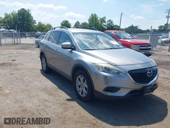 2015 Mazda CX-9 Sport z VIN JM3TB2BA3F0451593, wystawiony jako IAAI lot #42870124 z przebiegiem 196 390 mil mil oraz . Historia ofert i sprzedaży dostępna na DreamBid. Obrazek 1.