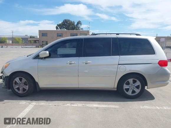 2009 Honda Odyssey Touring с VIN 5FNRL38969B013708, выставлен на аукционе IAAI как лот 42002538 с пробегом 198 220 миль миль и . История ставок и продаж доступна на DreamBid. Изображение 14.