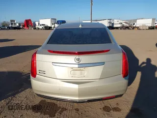 2014 Cadillac XTS with VIN 2G61L5S30E9207777, listed as a IAAI auction lot 41202654 with 112,565 mi miles. Bid and sale history available at carsss.com. Image 16.