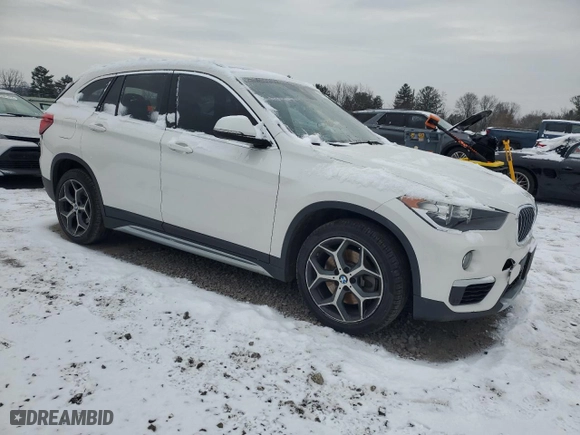 2019 BMW X1 xDrive28i with VIN WBXHT3C54K5L91407, listed as a Copart auction lot 84875904 with 97,304 mi miles and Salvage Title. Bid and sale history available at carsss.com. Image 4.
