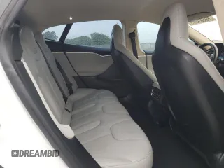 2014 Tesla Model S 60 с VIN 5YJSA1H19EFP52457, выставлен на аукционе Copart как лот 59589905 с пробегом 167 662 миль миль и Списание • Salvage title. История ставок и продаж доступна на DreamBid. Изображение 10.