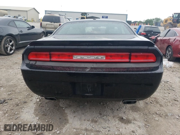 2013 Dodge Challenger SXT z VIN 2C3CDYAG6DH515778, wystawiony jako Copart lot #55976665 z przebiegiem 160 194 mil mil oraz Szkoda całkowita • Salvage title. Historia ofert i sprzedaży dostępna na DreamBid. Obrazek 6.