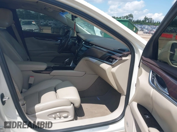2013 Cadillac XTS Luxury with VIN 2G61P5S34D9138319, listed as a IAAI auction lot 42626756 with 88,743 mi miles and . Bid and sale history available at DreamBid. Image 5.