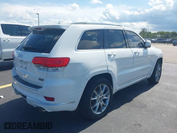 2015 Jeep Grand Cherokee Summit with VIN 1C4RJEJG5FC105038, listed as a IAAI auction lot 42555024 with 133,077 mi miles and . Bid and sale history available at DreamBid. Image 4.