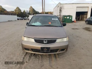 2003 Honda Odyssey LX z VIN 5FNRL18533B084504, wystawiony jako Copart lot #52674495 z przebiegiem 189 256 mil mil oraz Nie do naprawy • Non repairable. Historia ofert i sprzedaży dostępna na DreamBid. Obrazek 5.