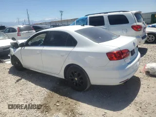 2014 Volkswagen Jetta SE with VIN 3VWD17AJ6EM265926, listed as a Copart auction lot 59060335 with 113,994 mi miles and Salvage title. Bid and sale history available at DreamBid. Image 2.