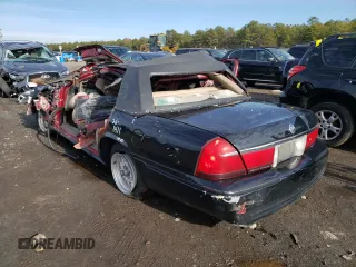 2000 Mercury Grand Marquis LS с VIN 2MEFM75W5YX704016, выставлен на аукционе Copart как лот 66122071 с пробегом Не указан миль и Списание • Salvage title. История ставок и продаж доступна на DreamBid. Изображение 3.