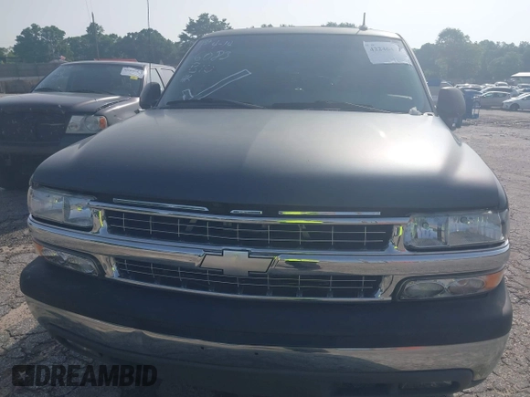 2002 Chevrolet Tahoe LS z VIN 1GNEC13ZX2R273935, wystawiony jako IAAI lot #42246472 z przebiegiem 205 995 mil mil oraz . Historia ofert i sprzedaży dostępna na DreamBid. Obrazek 6.
