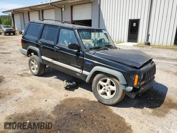 1998 Jeep Cherokee Sport with VIN 1J4FT68S9WL141631, listed as a Copart auction lot 68974974 with 0 mi miles and Salvage Title. Bid and sale history available at carsss.com. Image 4.