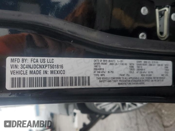 2023 Jeep Compass (RED) Edition z VIN 3C4NJDCNXPT501816, wystawiony jako Copart lot #55733075 z przebiegiem 25 039 mil mil oraz Szkoda całkowita • Salvage title. Historia ofert i sprzedaży dostępna na DreamBid. Obrazek 13.
