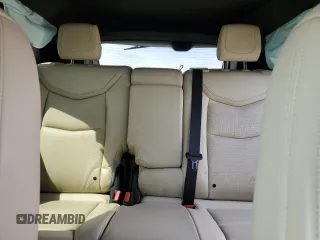 2017 Cadillac XT5 Premium Luxury AWD z VIN 1GYKNERS5HZ319259, wystawiony jako Copart lot #52554725 z przebiegiem Nie podano mil oraz Szkody całkowita. Historia ofert i sprzedaży dostępna na DreamBid. Obrazek 10.