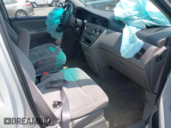 2004 Honda Odyssey LX with VIN 5FNRL18504B129349, listed as a IAAI auction lot 42393492 with 243,232 mi miles and . Bid and sale history available at DreamBid. Image 5.