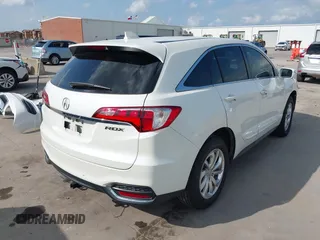 2018 Acura RDX with VIN 5J8TB3H39JL010714, listed as a IAAI auction lot 42128591 with 113,499 mi miles and . Bid and sale history available at DreamBid. Image 4.