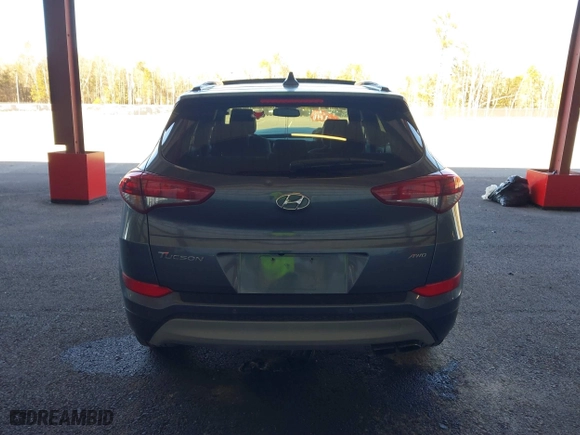 2018 Hyundai Tucson Value with VIN KM8J3CA20JU762120, listed as a IAAI auction lot 41878796 with 103,346 mi miles. Bid and sale history available at carsss.com. Image 16.