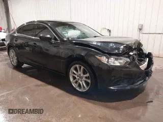 2014 Mazda 6 i Touring with VIN JM1GJ1V69E1155503, listed as a IAAI auction lot 41833295 with 143,582 mi miles and . Bid and sale history available at DreamBid. Image 1.