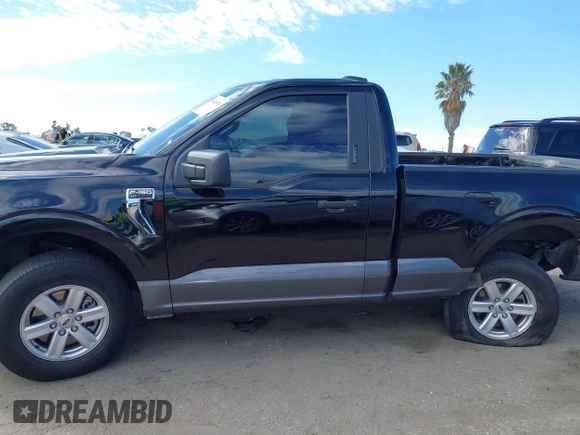 2022 Ford F-150 XL with VIN 1FTMF1E56NKE03194, listed as a IAAI auction lot 41620978 with 76,689 mi miles and . Bid and sale history available at DreamBid. Image 14.