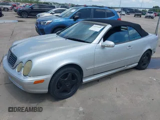 2001 Mercedes-Benz CLK 320/430 z VIN WDBLK70G71T074205, wystawiony jako IAAI lot #42319109 z przebiegiem 214 707 mil mil oraz . Historia ofert i sprzedaży dostępna na DreamBid. Obrazek 2.