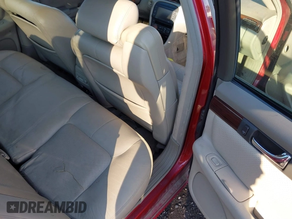 2003 Cadillac Seville Touring STS z VIN 1G6KY54983U212944, wystawiony jako IAAI lot #41656796 z przebiegiem 118 662 mil mil oraz . Historia ofert i sprzedaży dostępna na DreamBid. Obrazek 8.