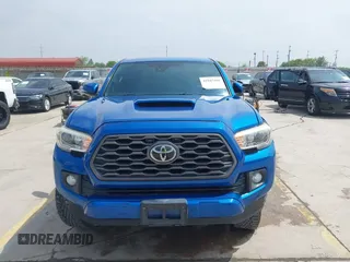 2018 Toyota Tacoma SR5 z VIN 5TFAZ5CN2JX064452, wystawiony jako IAAI lot #41945468 z przebiegiem 132 450 mil mil oraz . Historia ofert i sprzedaży dostępna na DreamBid. Obrazek 12.