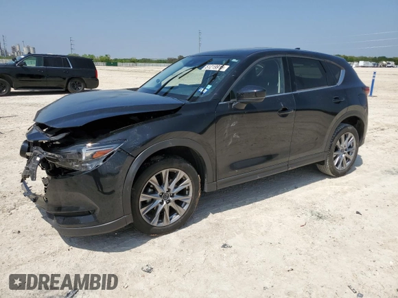 2021 Mazda CX-5 Grand Touring with VIN JM3KFADM5M0479247, listed as a Copart auction lot 51219915 with 33,384 mi miles and Salvage Title. Bid and sale history available at carsss.com. Image 1.