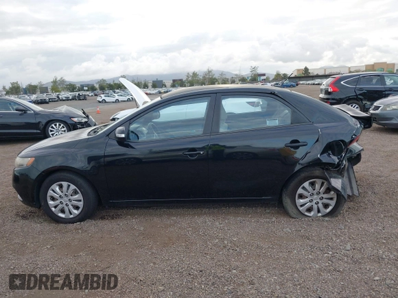 2010 Kia Forte EX with VIN KNAFU4A28A5050734, listed as a IAAI auction lot 42063165 with 179,284 mi miles. Bid and sale history available at carsss.com. Image 14.