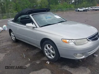 2001 Toyota Solara SE z VIN 2T1FF22P61C455554, wystawiony jako IAAI lot #41947978 z przebiegiem 152 245 mil mil oraz . Historia ofert i sprzedaży dostępna na DreamBid. Obrazek 1.
