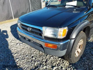 1997 Toyota 4Runner Limited with VIN JT3HN87R5V0077899, listed as a IAAI auction lot 41158201 with 332,243 mi miles. Bid and sale history available at carsss.com. Image 6.