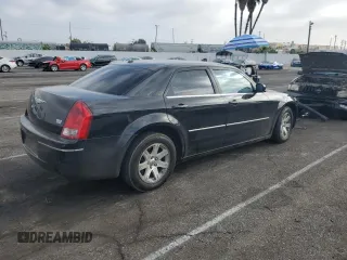 2007 Chrysler 300 Signature with VIN 2C3KA53G57H877394, listed as a Copart auction lot 71302834 with 134,697 mi miles and Salvage Title. Bid and sale history available at carsss.com. Image 3.