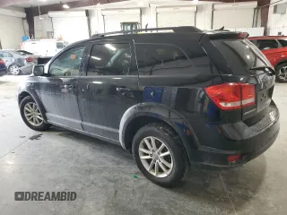 2015 Dodge Journey SXT with VIN 3C4PDCBG7FT742261, listed as a Copart auction lot 89188755 with 73,489 mi miles and Salvage Title. Bid and sale history available at carsss.com. Image 2.