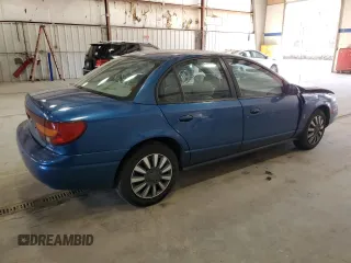 2001 Saturn SL z VIN 1G8ZK52791Z210421, wystawiony jako Copart lot #48808595 z przebiegiem 98 960 mil mil oraz Szkoda całkowita • Salvage title. Historia ofert i sprzedaży dostępna na DreamBid. Obrazek 3.