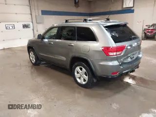 2011 Jeep Grand Cherokee Laredo with VIN 1J4RR4GG7BC578079, listed as a IAAI auction lot 42491750 with 197,581 mi miles and . Bid and sale history available at DreamBid. Image 3.