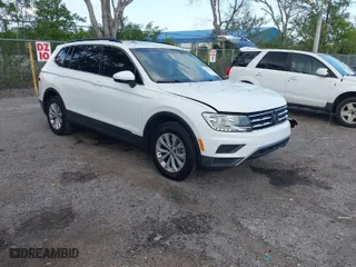 2019 Volkswagen Tiguan SE with VIN 3VV3B7AX4KM081310, listed as a IAAI auction lot 41941341 with 100,231 mi miles. Bid and sale history available at carsss.com. Image 1.