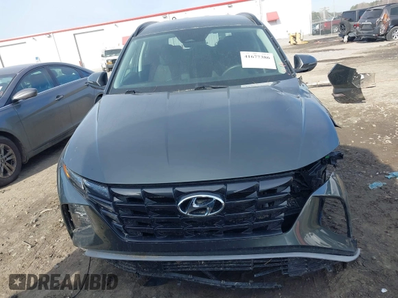 2022 Hyundai Tucson SEL with VIN 5NMJBCAEXNH031855, listed as a IAAI auction lot 41677386 with 40,606 mi miles and . Bid and sale history available at DreamBid. Image 13.