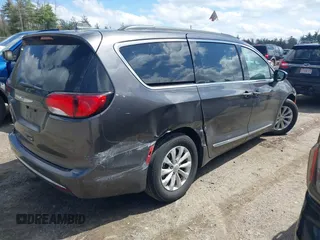 2017 Chrysler Pacifica Touring L with VIN 2C4RC1BGXHR667397, listed as a IAAI auction lot 42085117 with 63,996 mi miles and . Bid and sale history available at DreamBid. Image 4.