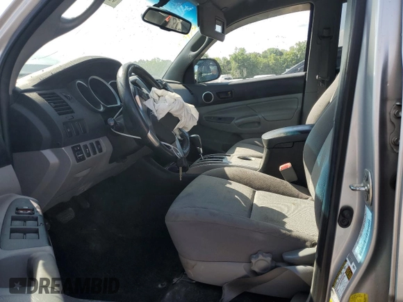 2013 Toyota Tacoma with VIN 3TMLU4EN7DM132916, listed as a Copart auction lot 59885795 with 196,011 mi miles and Salvage title. Bid and sale history available at DreamBid. Image 7.