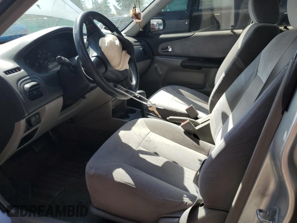 2003 Mazda Protege DX with VIN JM1BJ225730217866, listed as a Copart auction lot 53854075 with 105,782 mi miles and Salvage Title. Bid and sale history available at DreamBid. Image 7.