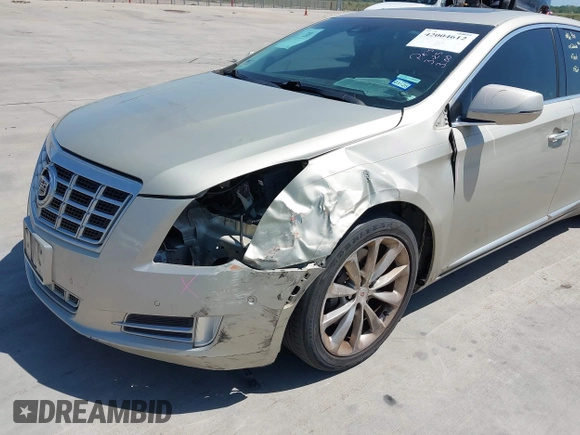 2014 Cadillac XTS Premium with VIN 2G61P5S33E9157607, listed as a IAAI auction lot 42004612 with 111,047 mi miles and . Bid and sale history available at DreamBid. Image 6.