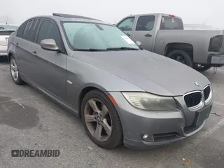 2011 BMW 3 Series 328i with VIN WBAPH5G5XBNM76717, listed as a IAAI auction lot 41796390 with 166,202 mi miles. Bid and sale history available at carsss.com. Image 1.