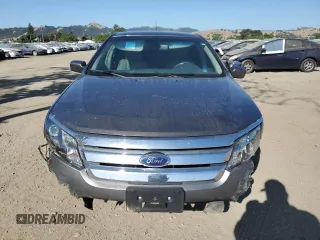 2012 Ford Fusion SEL z VIN 3FAHP0JA0CR398150, wystawiony jako Copart lot #57864455 z przebiegiem 166 046 mil mil oraz Szkoda całkowita • Salvage title. Historia ofert i sprzedaży dostępna na DreamBid. Obrazek 5.