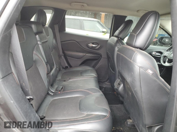 2016 Jeep Cherokee Trailhawk with VIN 1C4PJMBB0GW164437, listed as a Copart auction lot 54776985 with 158,801 mi miles and Salvage title. Bid and sale history available at DreamBid. Image 12.