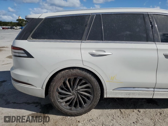 2021 Lincoln Aviator Reserve z VIN 5LM5J7WCXMGL18310, wystawiony jako Copart lot #76247904 z przebiegiem 69 111 mil mil oraz Nie do naprawy • Non repairable. Historia ofert i sprzedaży dostępna na DreamBid. Obrazek 13.