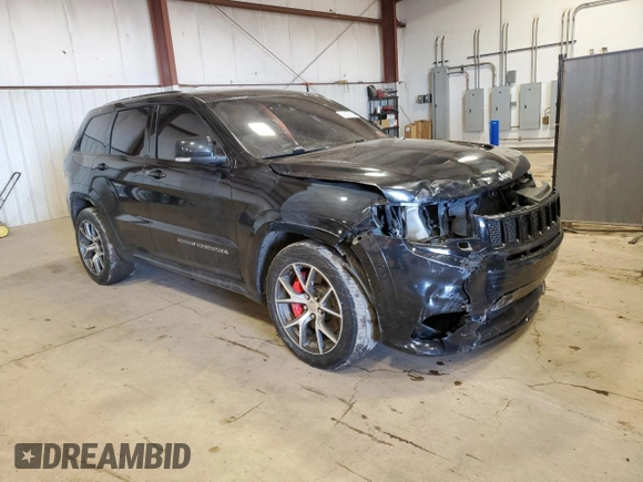 2017 Jeep Grand Cherokee SRT with VIN 1C4RJFDJ1HC760023, listed as a Copart auction lot 45227385 with 95,135 mi miles and Salvage Title. Bid and sale history available at carsss.com. Image 4.
