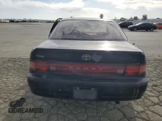 1993 Toyota Camry LE with VIN JT2SK12E4P0112014, listed as a Copart auction lot 52822095 with 249,458 mi miles and Salvage Title. Bid and sale history available at carsss.com. Image 6.