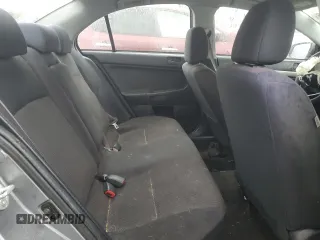 2014 Mitsubishi Lancer SE z VIN JA32V2FW8EU020237, wystawiony jako Copart lot #50333595 z przebiegiem 128 289 mil mil oraz Szkoda całkowita • Salvage title. Historia ofert i sprzedaży dostępna na DreamBid. Obrazek 10.