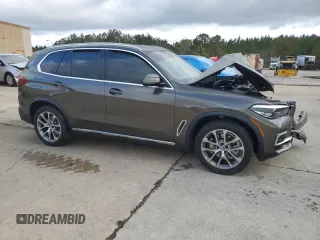 2023 BMW X5 sDrive40i with VIN 5UXCR4C07P9N73360, listed as a Copart auction lot 51128055 with Not provided miles and Salvage title. Bid and sale history available at DreamBid. Image 4.