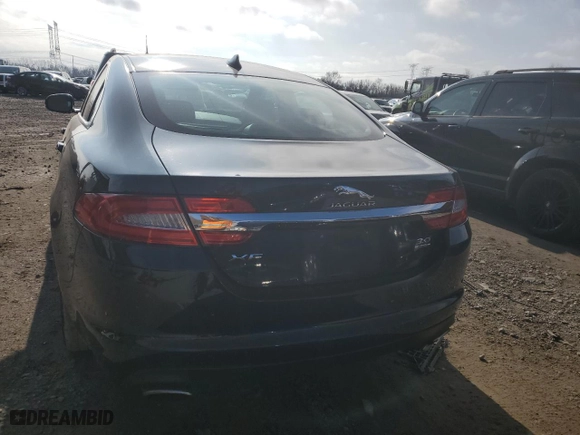 2015 Jaguar XF V6 Portfolio with VIN SAJWJ0FF2F8U53521, listed as a Copart auction lot 85555784 with 100,969 mi miles and Salvage Title. Bid and sale history available at carsss.com. Image 6.