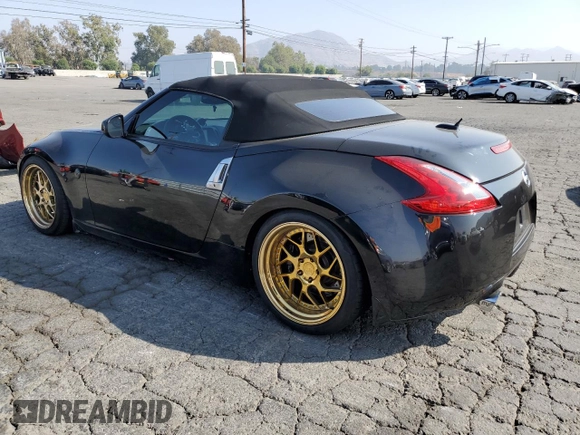 2012 Nissan 370Z Touring with VIN JN1AZ4FH8CM370157, listed as a Copart auction lot 76075624 with 112,644 mi miles and Salvage Title. Bid and sale history available at carsss.com. Image 2.