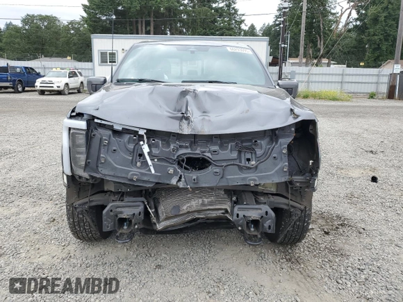 2023 Ford F-150 Lightning Pro with VIN 1FT6W1EV9PWG25278, listed as a Copart auction lot 60293095 with 24,450 mi miles and Salvage title. Bid and sale history available at DreamBid. Image 5.